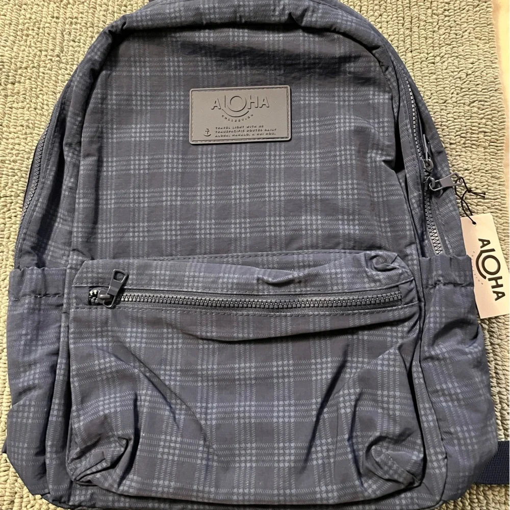 ALOHA Collection Navy Travel Backpack - NWT
Color: Palaka Keep it light Navy - Picture 1 of 6